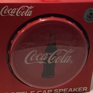 NIB Coca Cola Bottle Cap Bluetooth Speaker with LED lights.